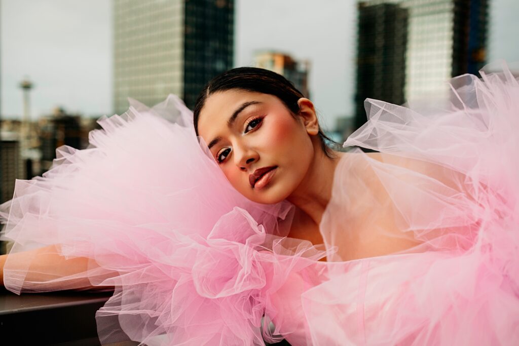 Downtown Seattle rooftop photoshoot, woman in a pink poofy dress, Belltown, Seattle, Space Needle in the back